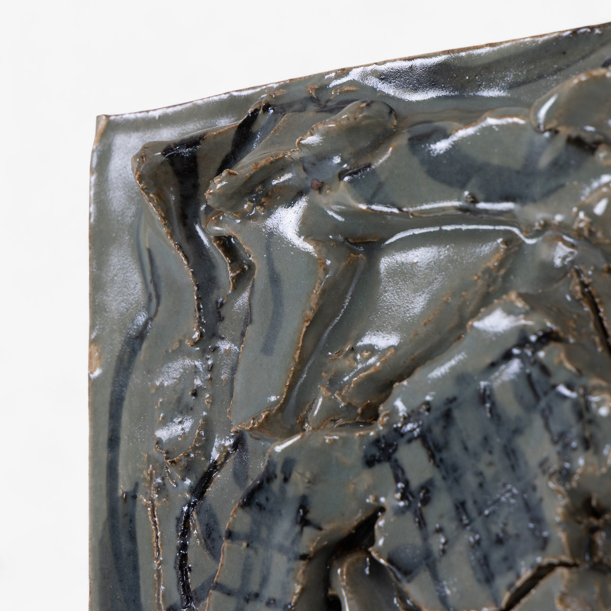 Relief i stentøj