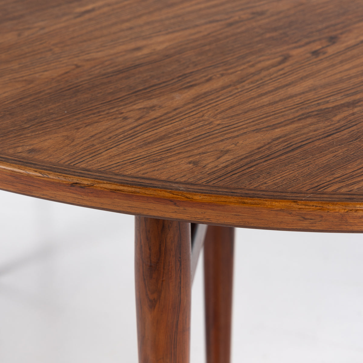 Oval dining table in rosewood