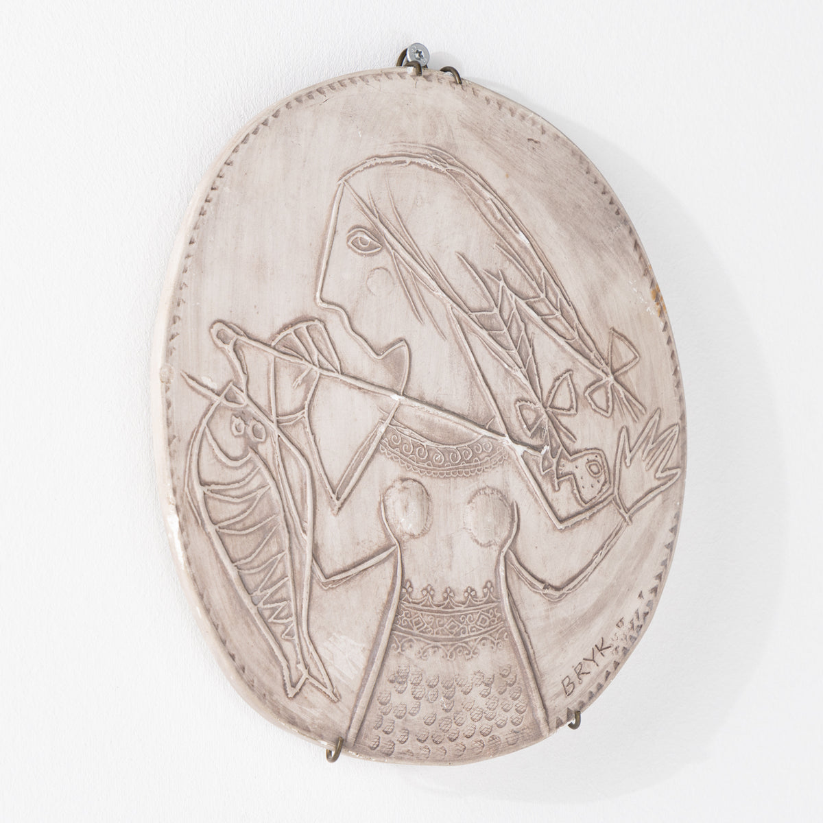 Relief i stentøj