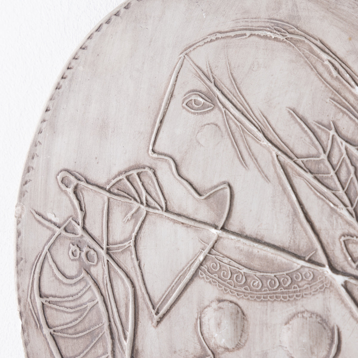 Relief i stentøj
