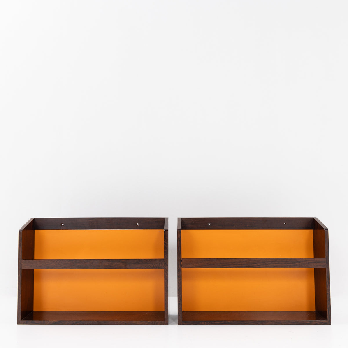 Pair of wall-mounted magazine racks