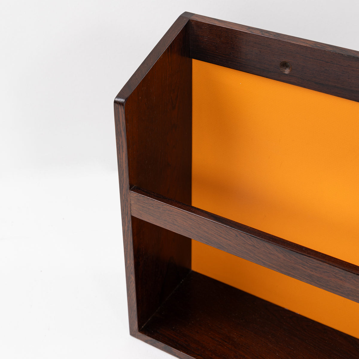 Pair of wall-mounted magazine racks