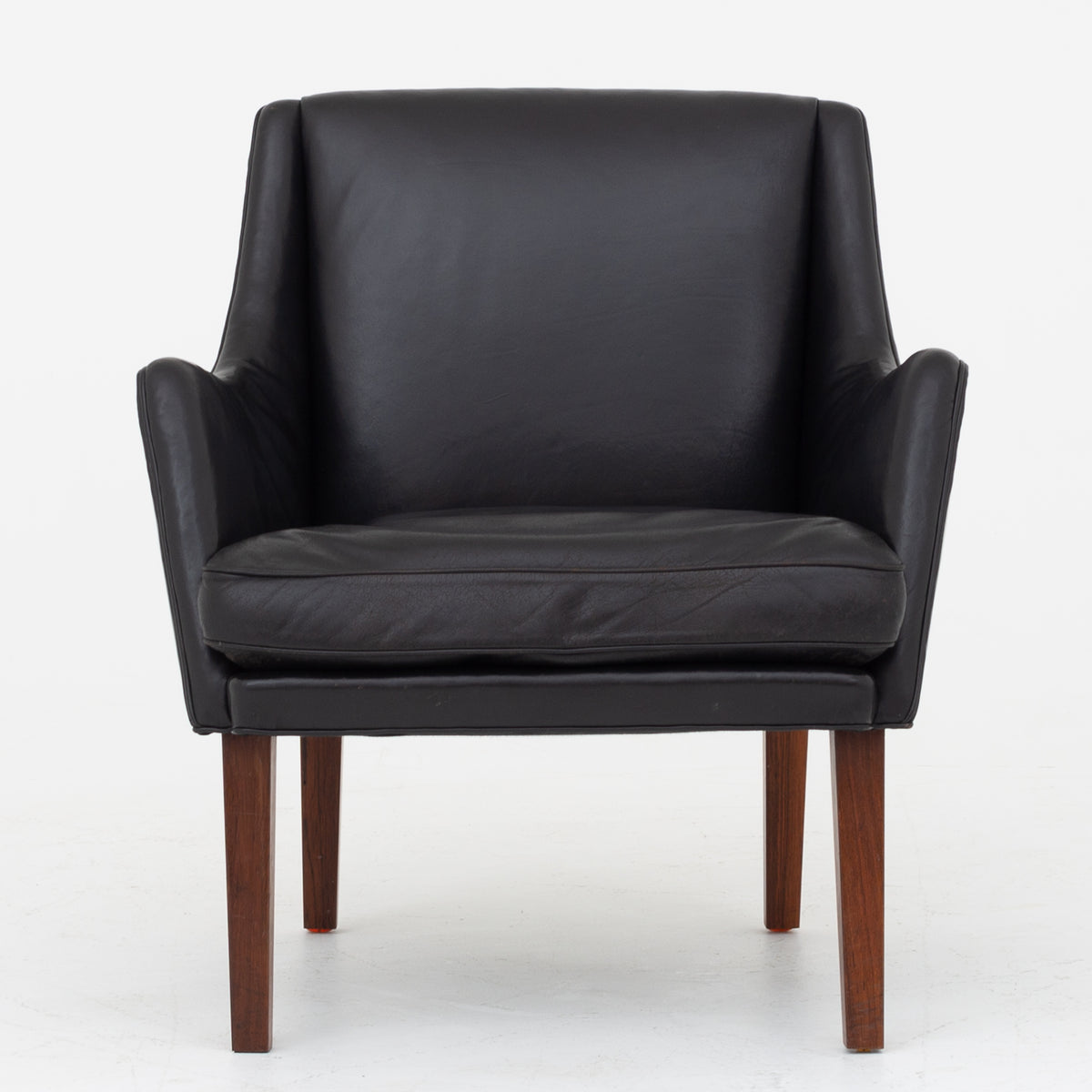 Easy chair in black leather