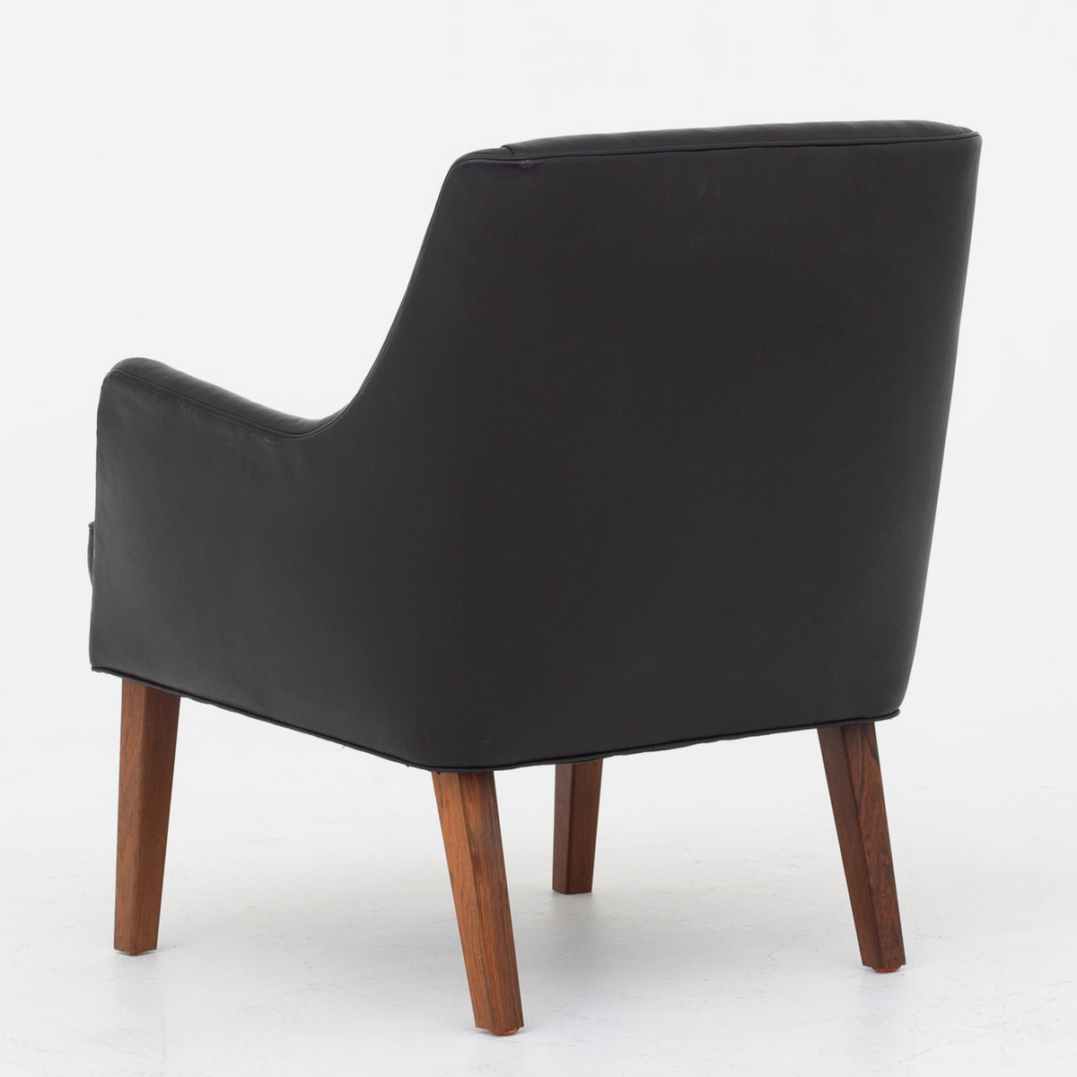 Easy chair in black leather