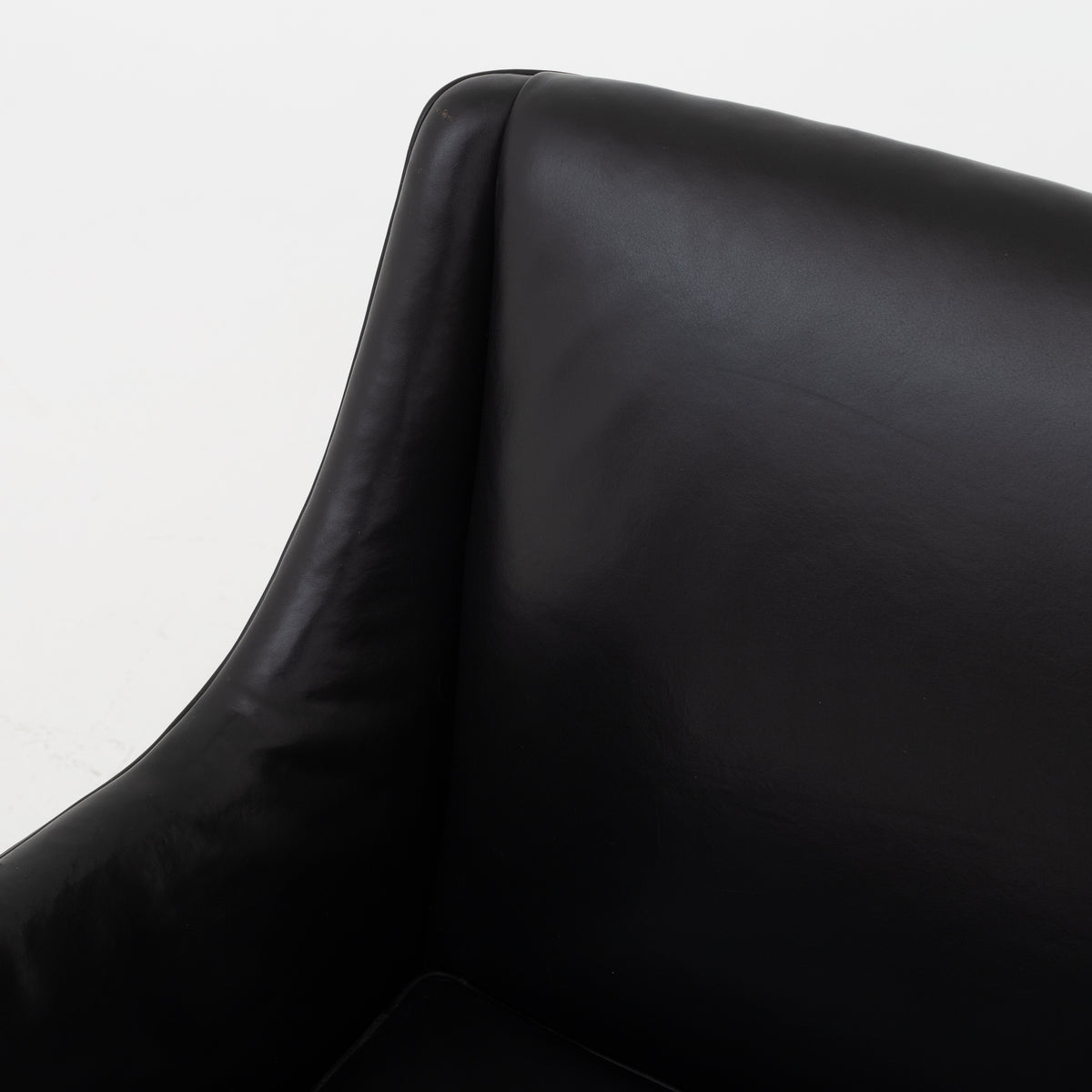 Easy chair in black leather