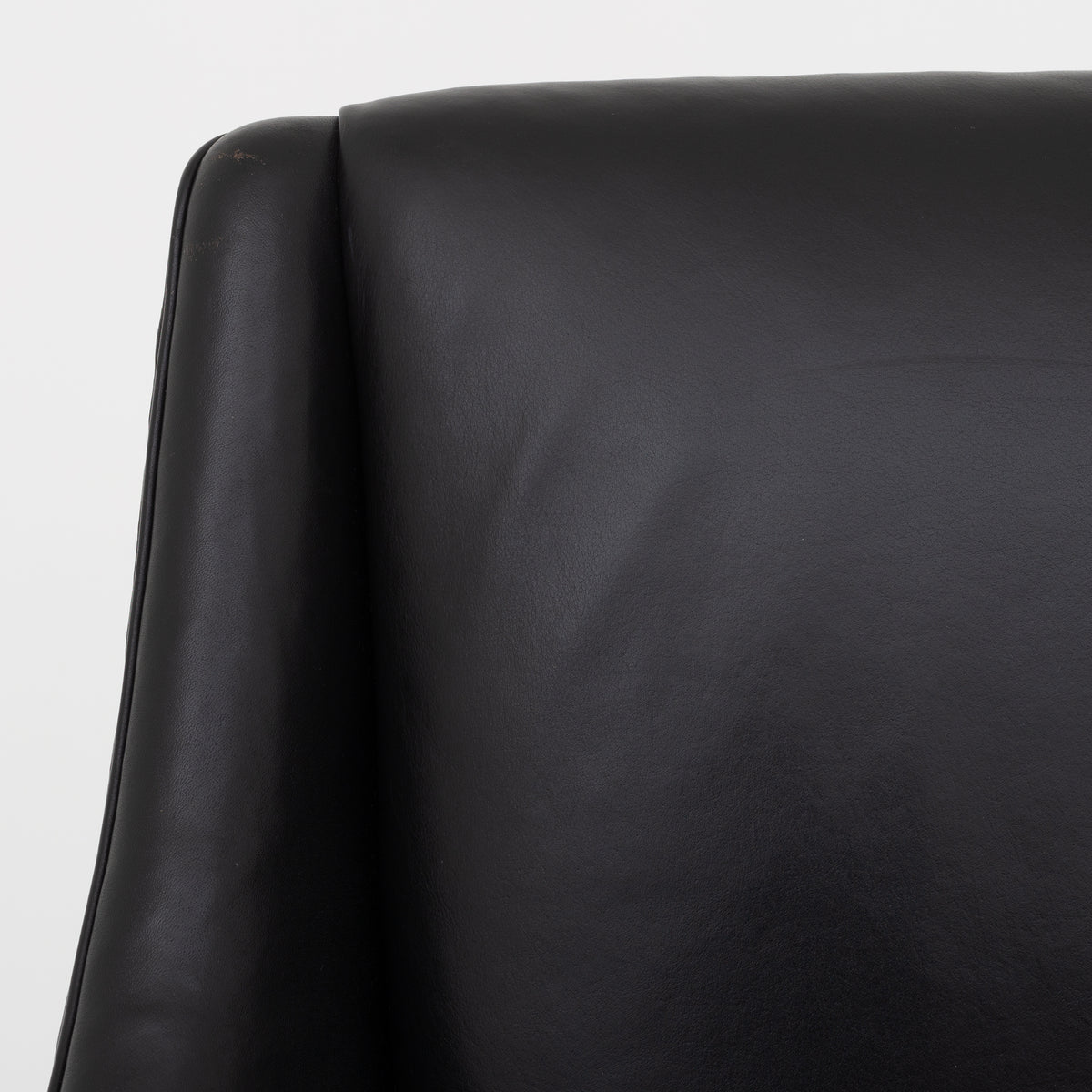 Easy chair in black leather