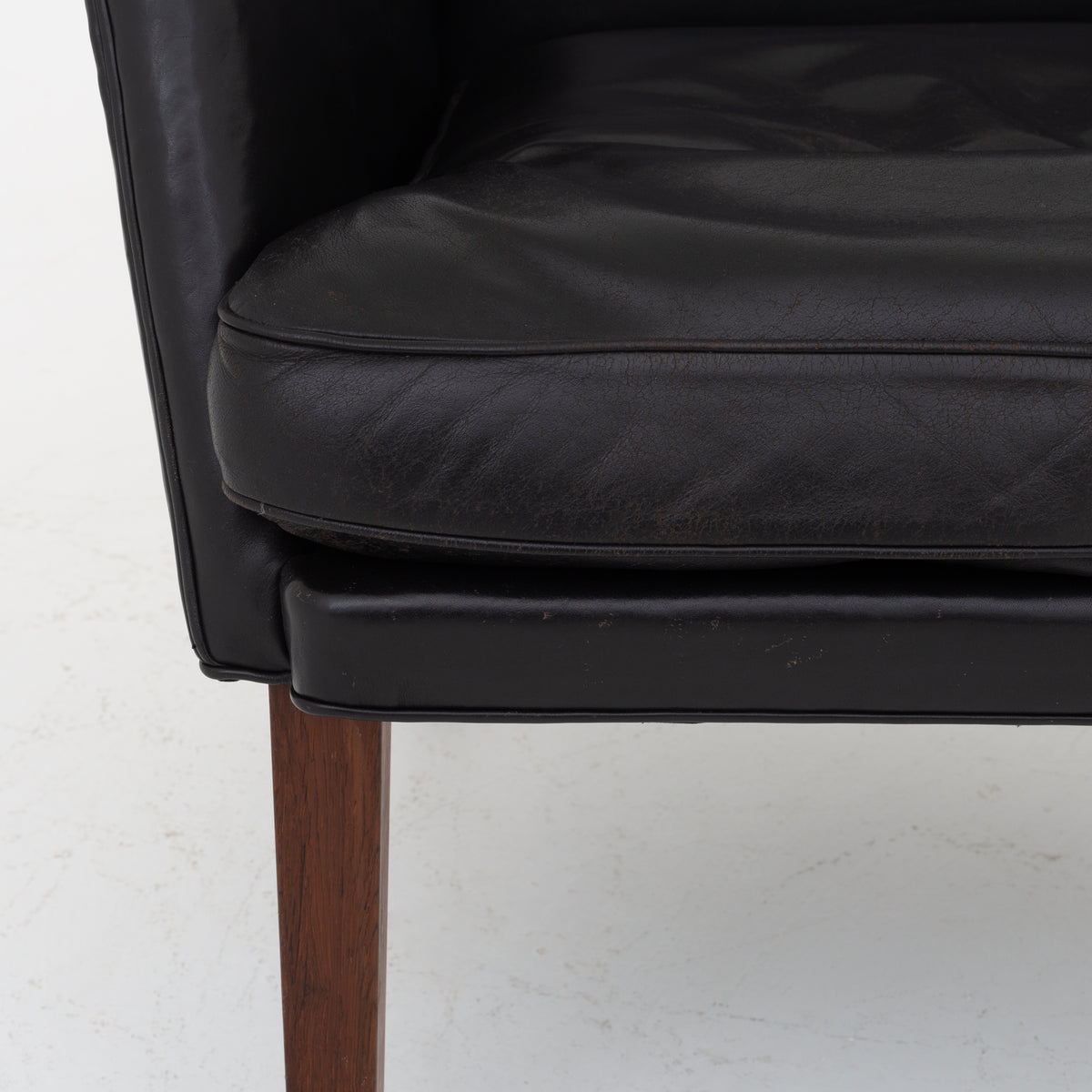 Easy chair in black leather