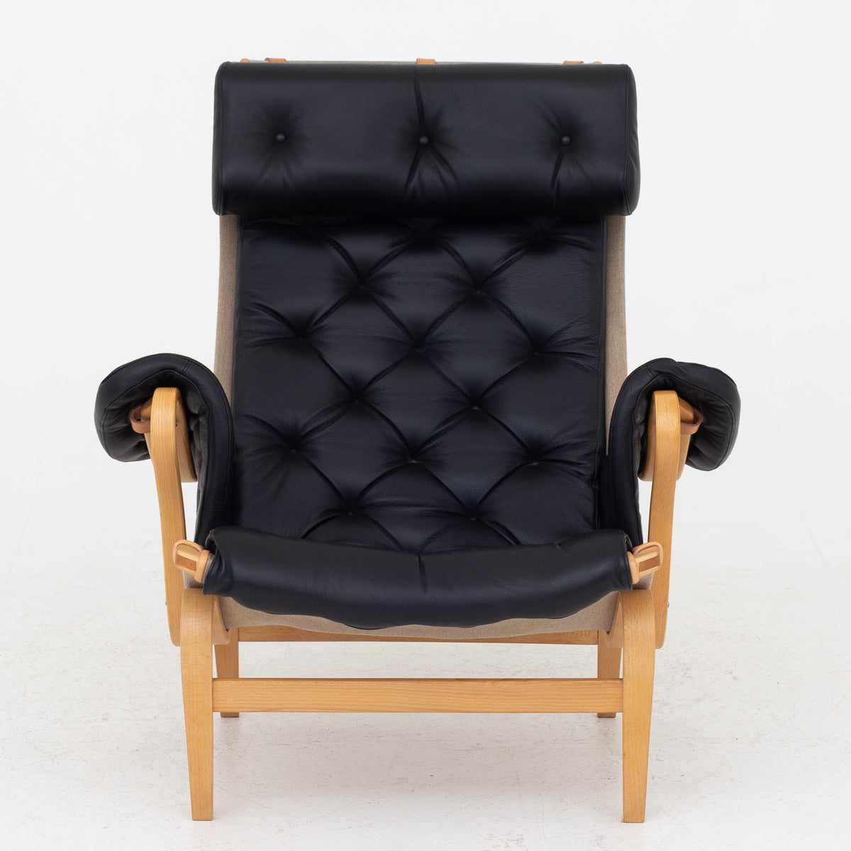 Pernilla 69 - Easy chair in black leather