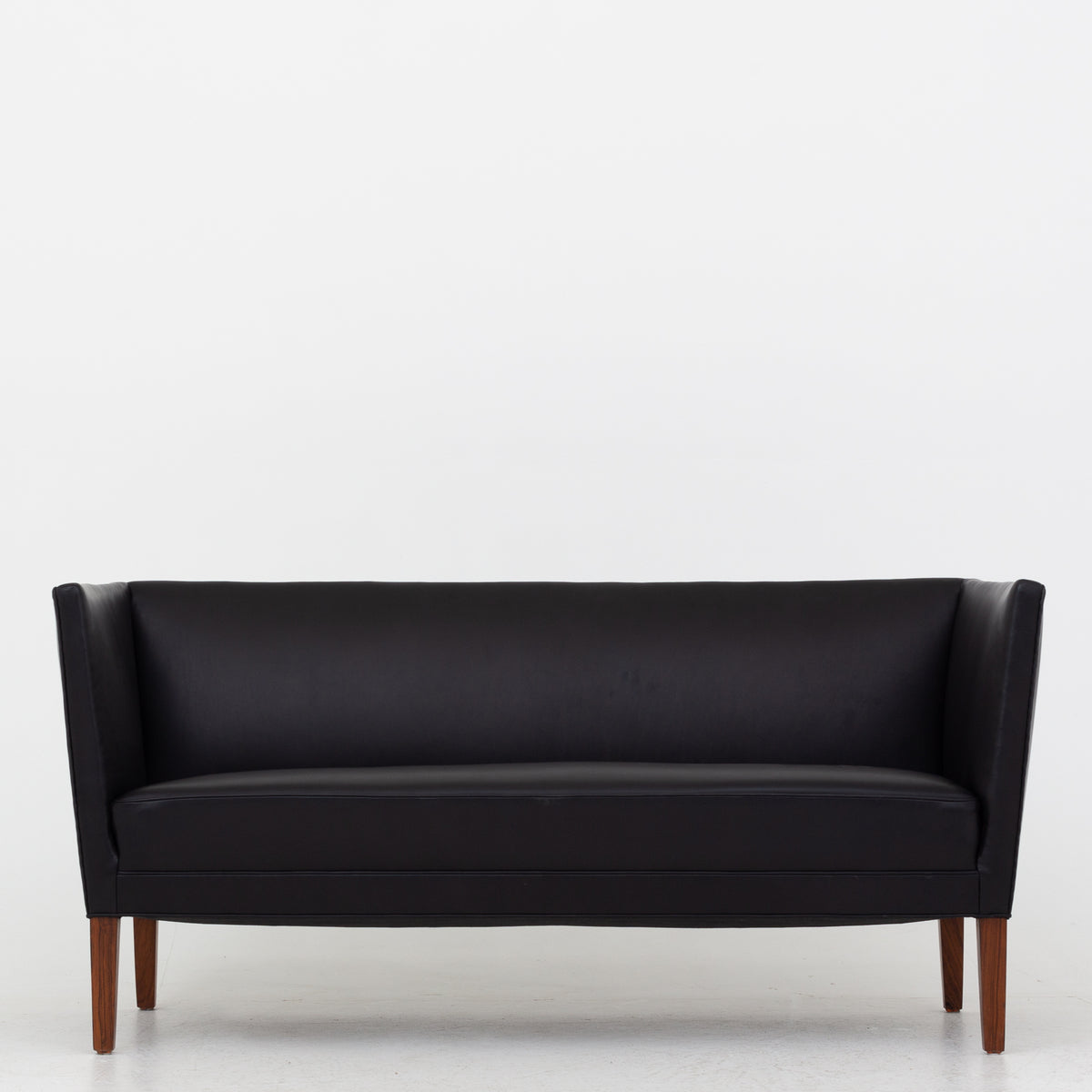 2 pers. sofa i sort læder