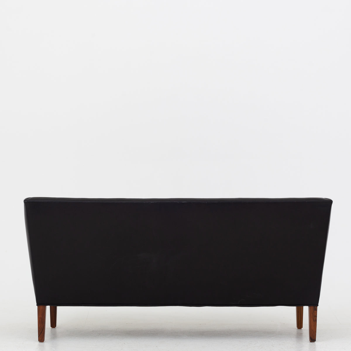 2 pers. sofa i sort læder