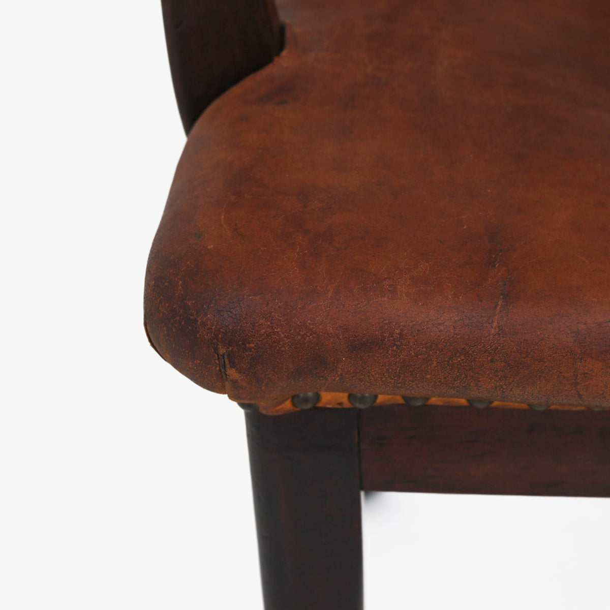 Armchair in patinated leather