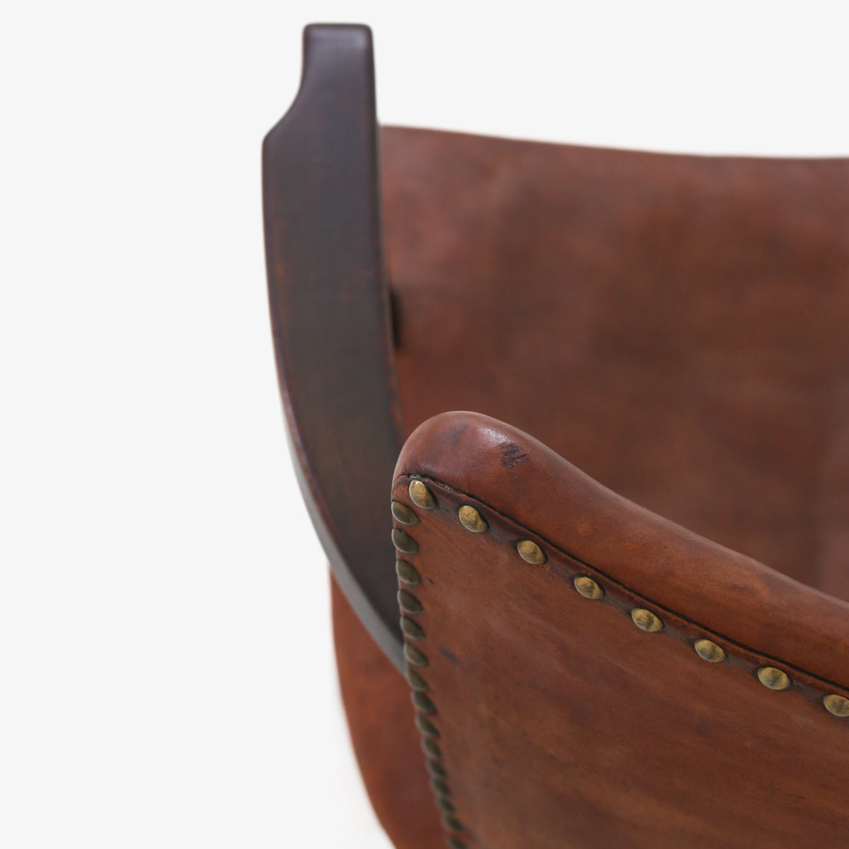 Armchair in patinated leather
