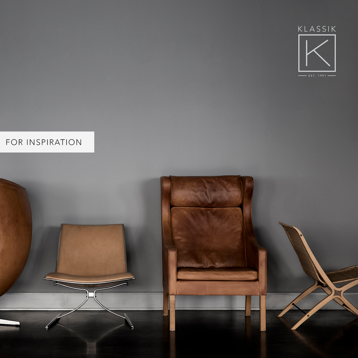 BM 2204 - A pair of Wingback Chairs in natural leather