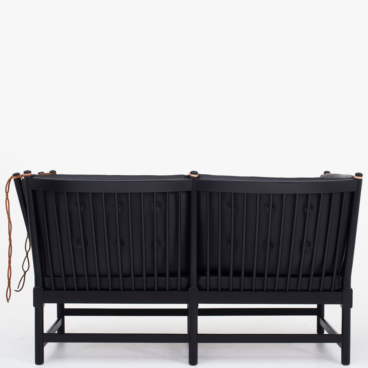 BM 1789 - Spoke back sofa in black leather