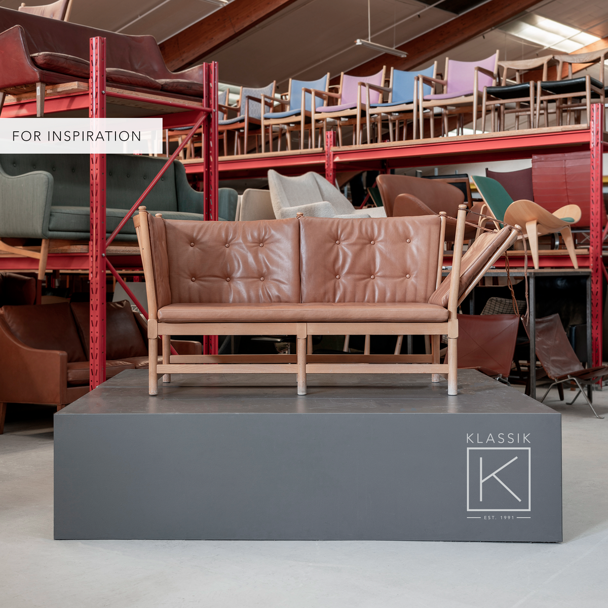 BM 1789 - Spoke back sofa in black leather