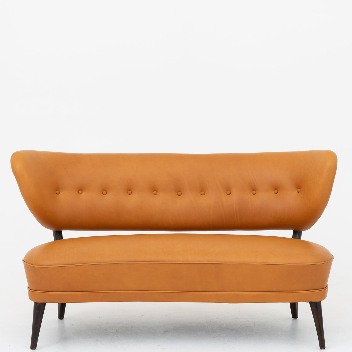 Sofa i cognac-læder