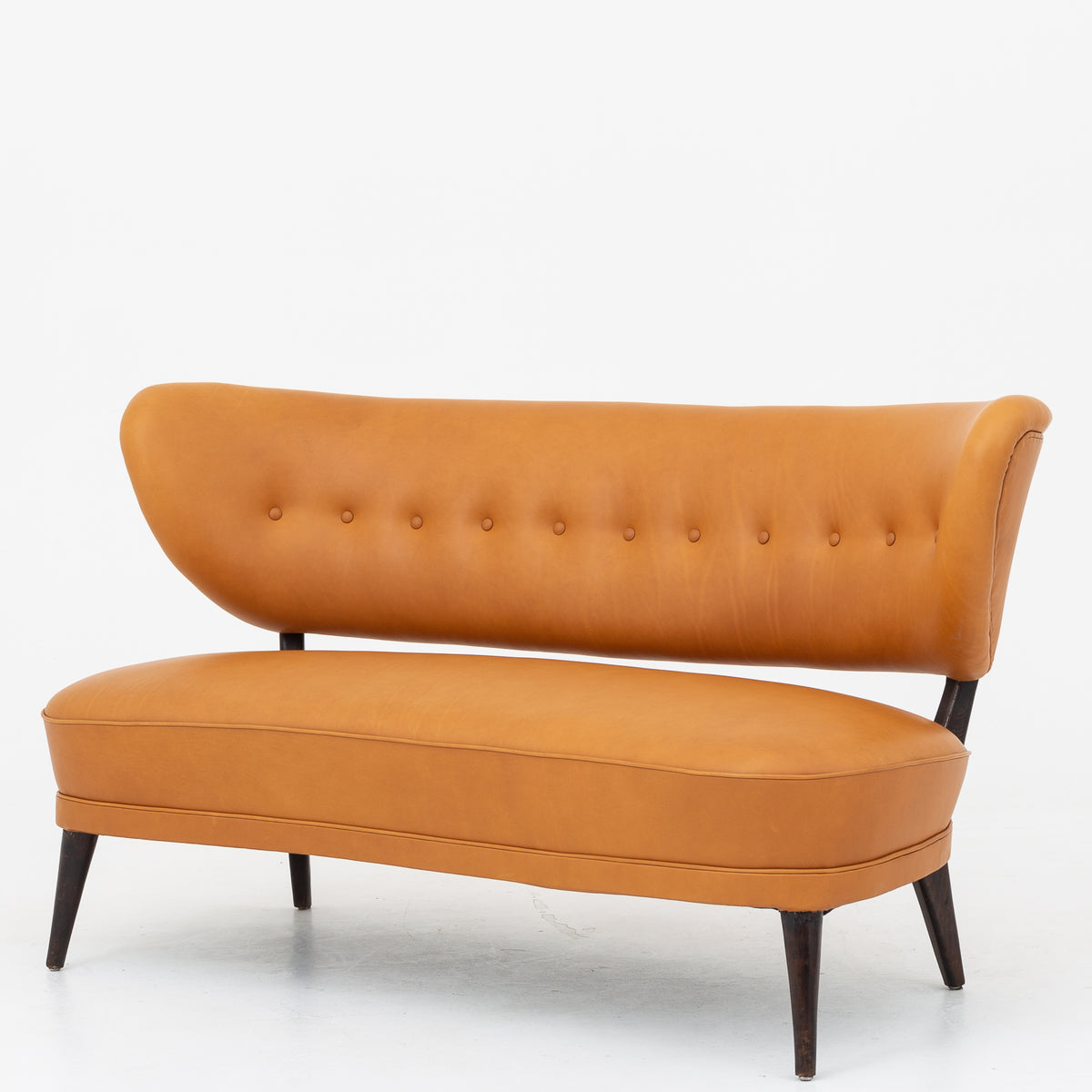Sofa i cognac-læder