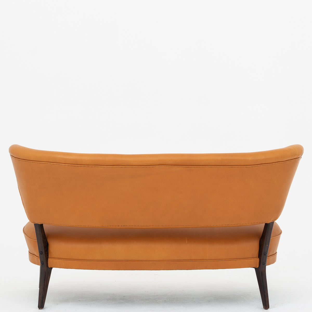 Sofa i cognac-læder